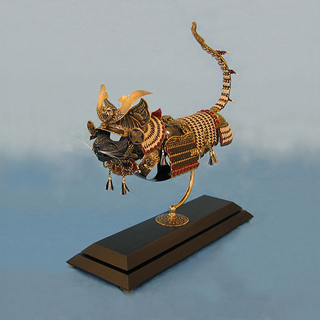 Illustration for article titled Animal-Shaped Armor for the Eternal Battle of Cats vs. Mice